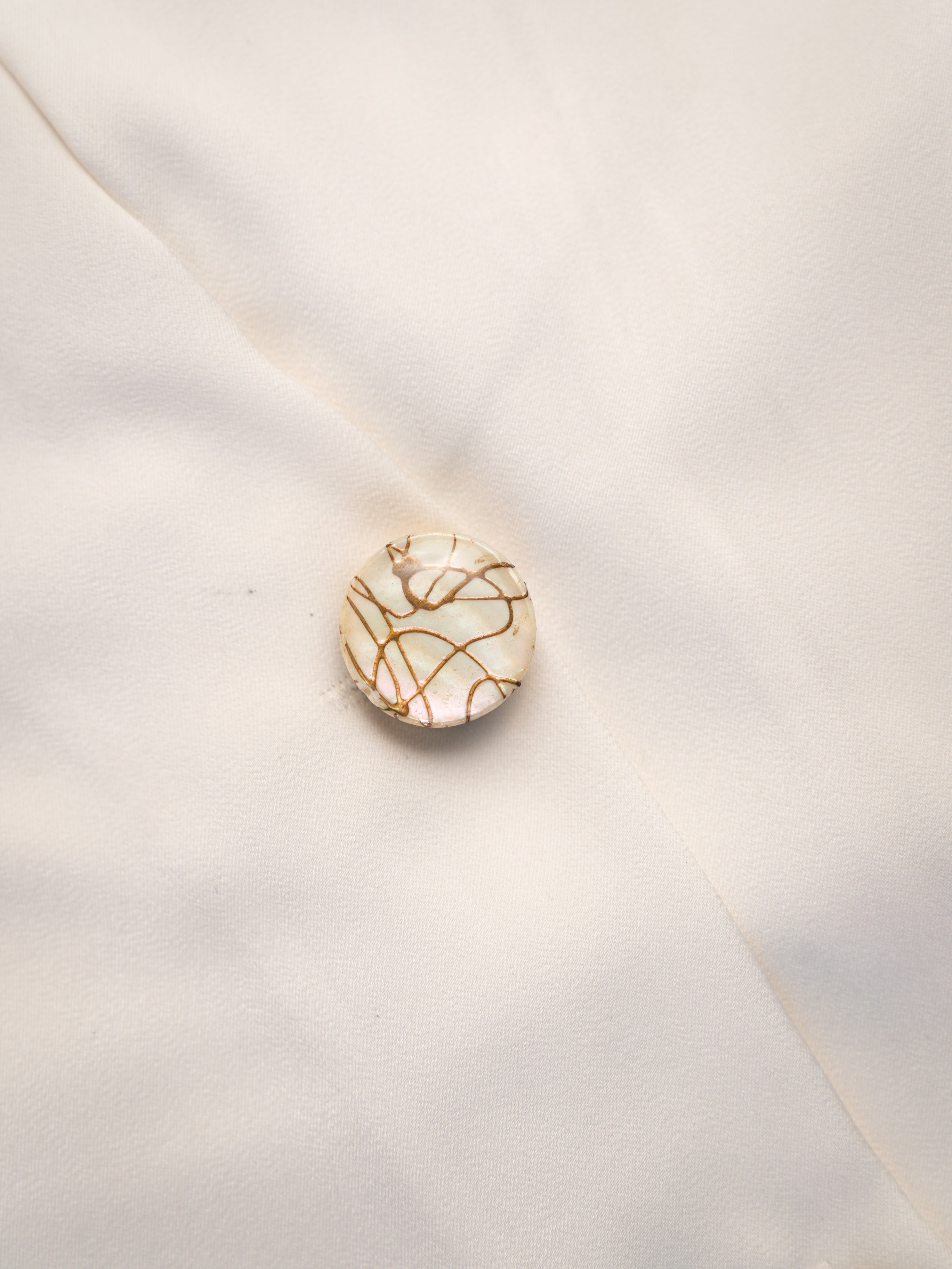 Golden Accent– Button Covers with a Golden Accent for a Refined Look