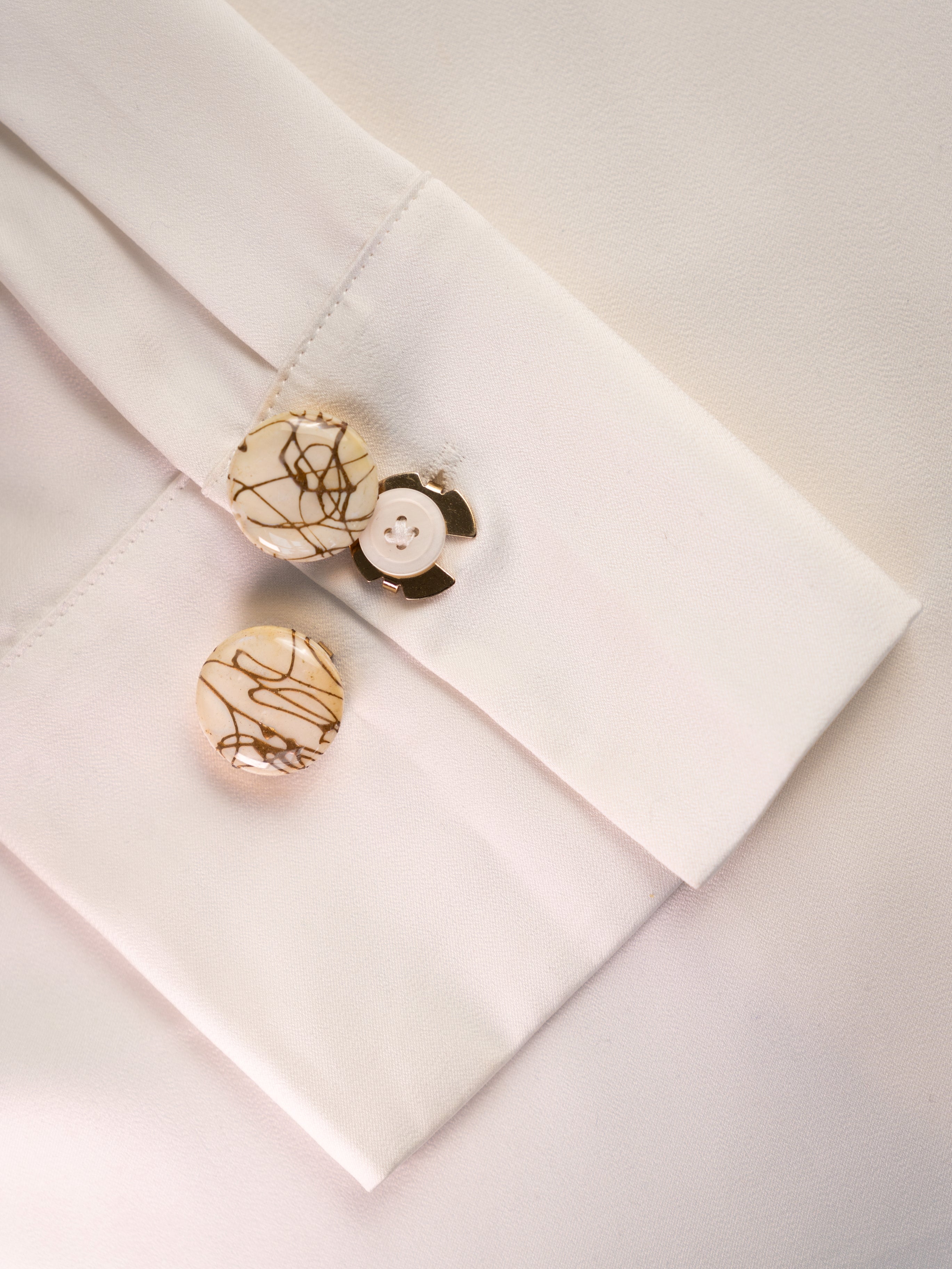 Golden Accent– Button Covers with a Golden Accent for a Refined Look